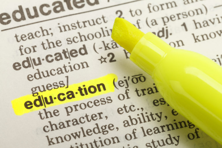 shutterstock_176597516 The Word Education Highlighted in Dictionary with Yellow Marker Highlighter Pen.