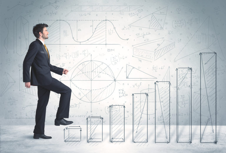 shutterstock_270603101 Business man climbing up on hand drawn graphs concept on background