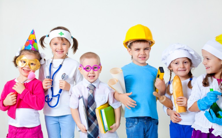 shutterstock_127688342 Group of six children dressing up as professions