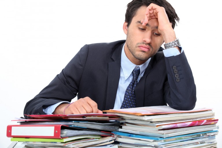 shutterstock_100840450 Stressed young professional