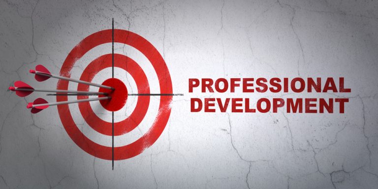 shutterstock_374132590 Studying concept: target and Professional Development on wall background