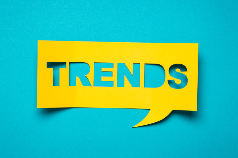 shutterstock_369907340 Bubble speech with cut out phrase "trends" in the paper.