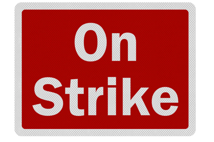 shutterstock_68184475 Photo realistic 'on strike' sign, isolated on white