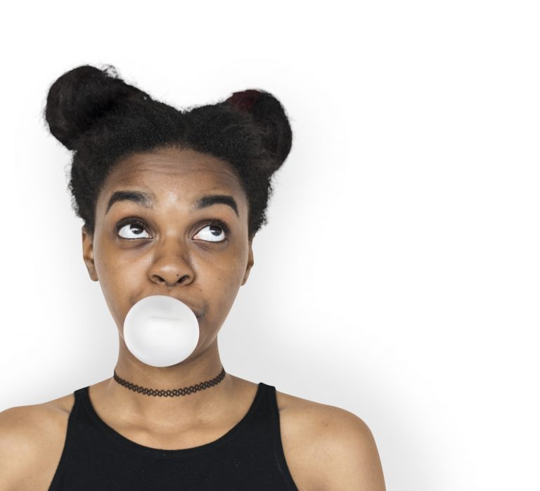 Woman Blowing Bubble Gum