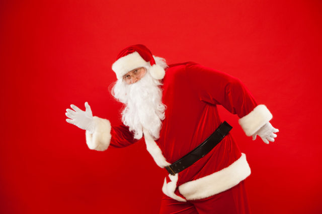 Running Santa Claus Red Background Merry Christmas
