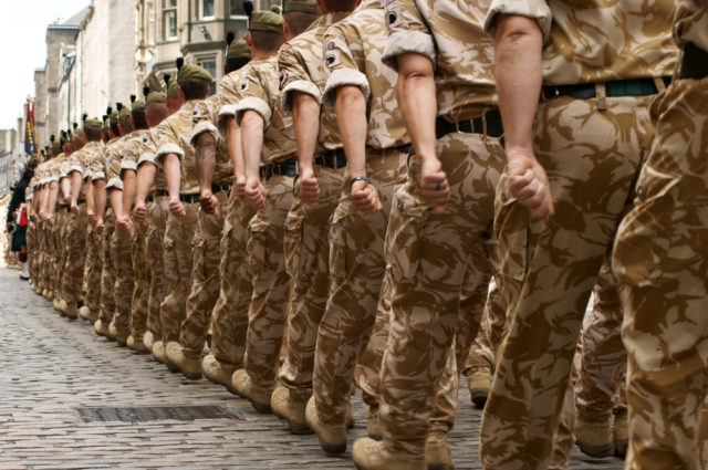 By StockCube Royalty-free stock photo ID: 68816545 A column of British soldiers on a homecoming march.